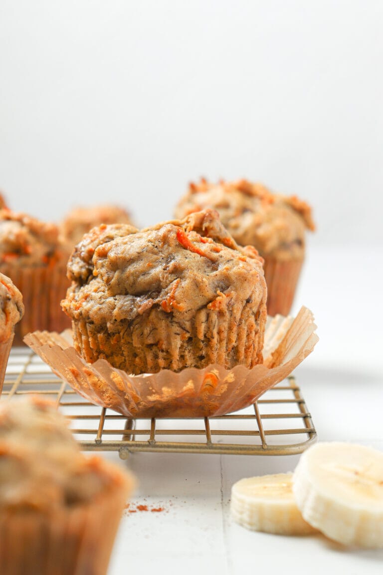 Decadent banana chocolate chip muffins with moist texture and rich flavor. Perfect for breakfast or an indulgent snack.